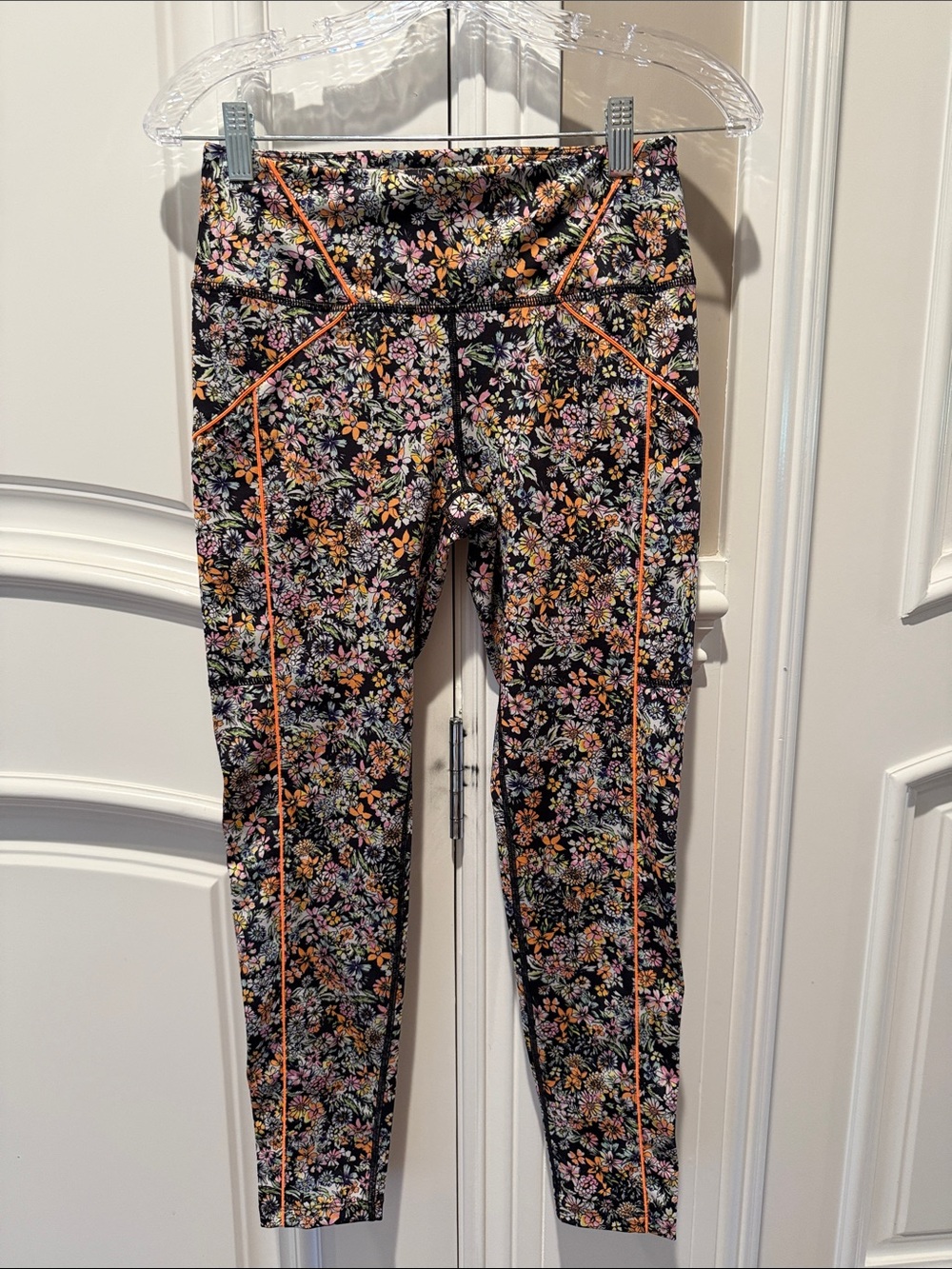 FP Movement by Free People Black Floral Leggings with Orange Piping